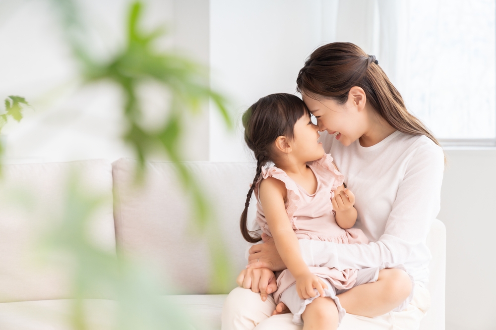 portrait of asian mam and daughter