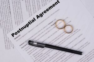 Postnuptial Marriage contract, Marital Settlement Separation Agreement paper document symbolizing divorce, prenuptial contract, prenup, breakup for Canada, USA, United Kindom (UK).