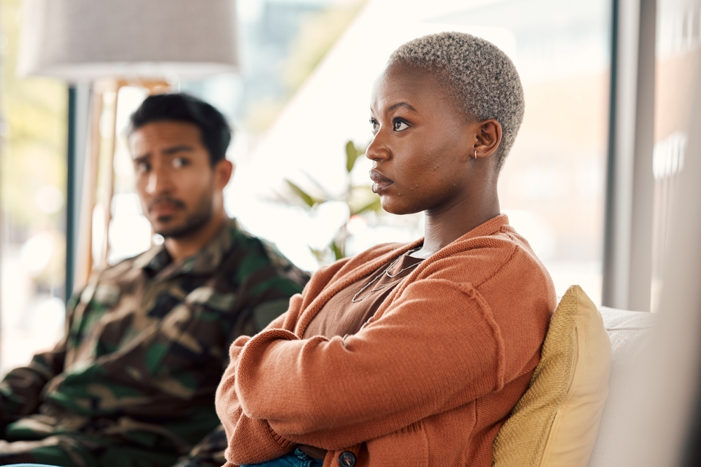 Fight, conflict and couple on sofa in therapy for argument, marriage problem and divorce counseling.